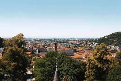 High angle shot of townscape against clear sky