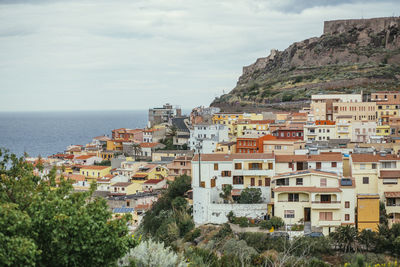 High angle view of town by sea