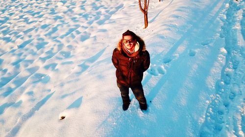 High angle view of man on snow field