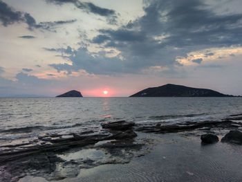 Scenic view of sea against sky during sunset