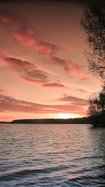 Scenic view of sea at sunset