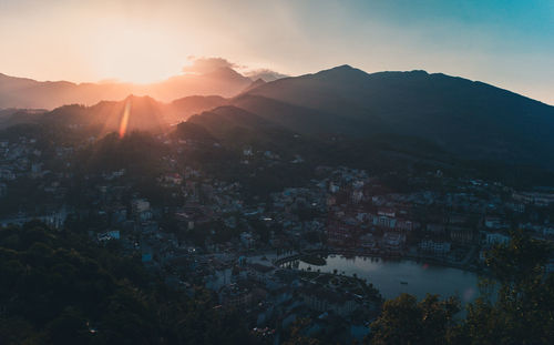 Scenic view of mountains against sky at sunset