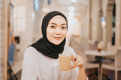 Portrait of a smiling young woman