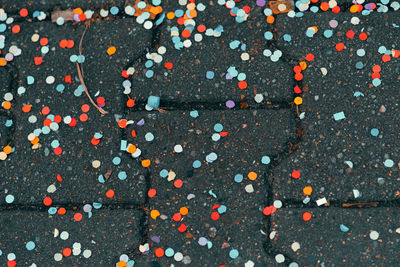 Full frame shot of multi colored umbrella on street