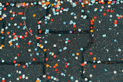 Full frame shot of multi colored umbrella on street