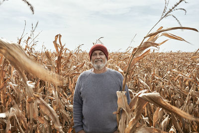 Full length of man standing in field