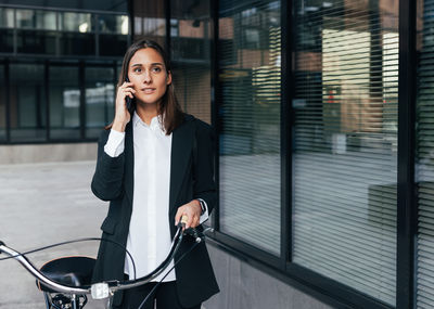 Young woman using mobile phone