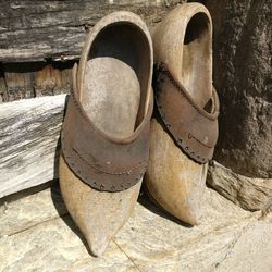 Close-up of shoes on wood