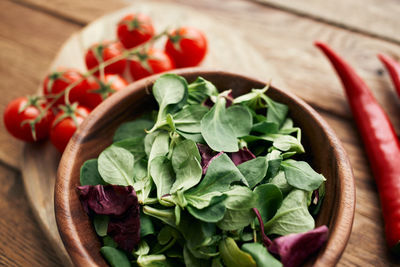 High angle view of chopped vegetables in bowl on table