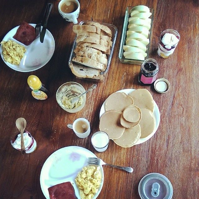 food and drink, indoors, table, freshness, still life, food, drink, high angle view, plate, spoon, wood - material, refreshment, directly above, bowl, healthy eating, coffee cup, fork, ready-to-eat, coffee - drink, breakfast