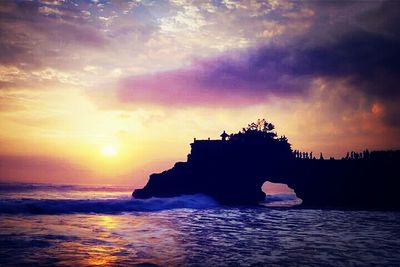 Scenic view of sea at sunset