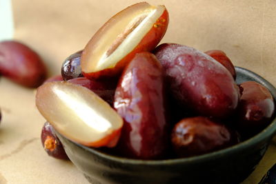 Close-up of fruits in bowl on table