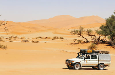 View of desert against clear sky