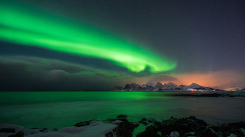 Scenic view of sea against sky at night