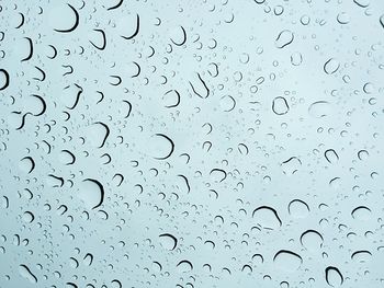 Close-up of water drops on glass