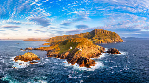 Scenic view of coastline against sky