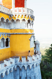 Colorful castle against cloudless sky