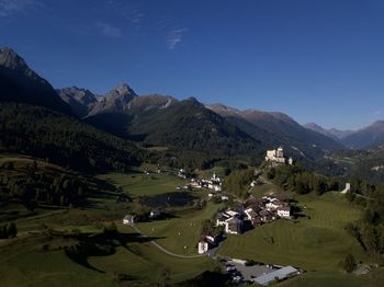 Scenic view of landscape and mountains against sky