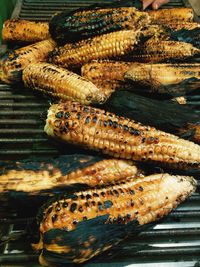 Close-up of meat on barbecue grill