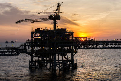 Silhouette of oil production platform