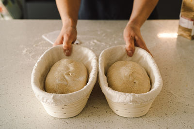 Midsection of person preparing food