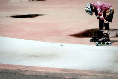 Low section of person skateboarding on skateboard