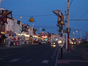 Illuminated street light at night