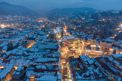 High angle view of illuminated city during winter