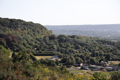 High angle view of trees and buildings against sky