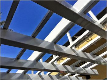 Low angle view of building against blue sky