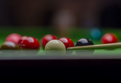 Close-up of multi colored balls on table