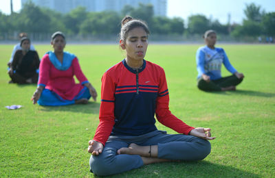 People sitting on field