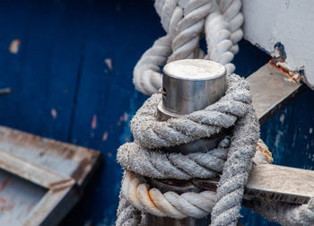 Close-up of rope tied on wood