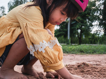 Low angle view of girl playing