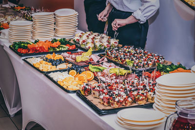 Midsection of woman holding food