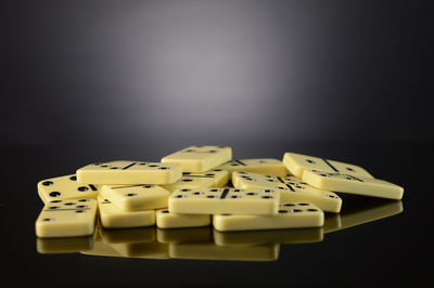 Close-up of objects on table against black background