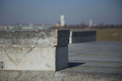 Close-up of retaining wall against clear sky