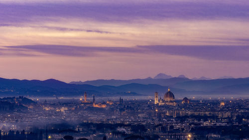 High angle view of townscape against sky at dusk