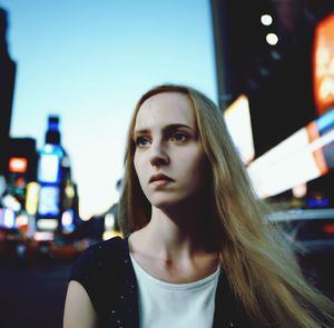 Portrait of a young woman in times square nyc