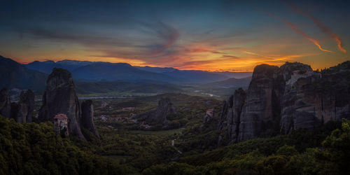 Scenic view of mountains against sky during sunset