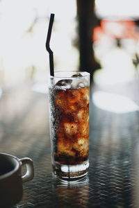 Close-up of beer glass on table