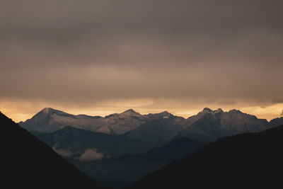 Scenic view of mountains against sky during sunset