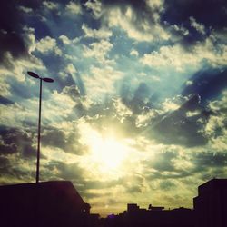 Low angle view of cloudy sky at sunset