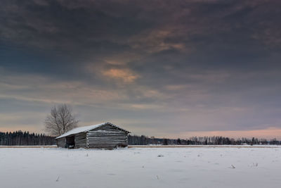 Scenic view of snow covered trees against sky