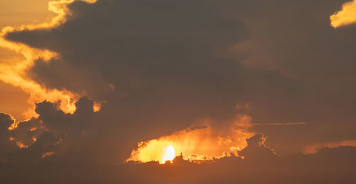 Scenic view of dramatic sky during sunset