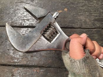 Close-up of man working on wood