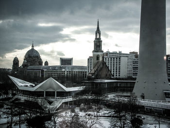 View of buildings against sky during winter