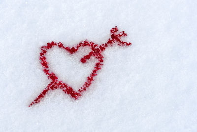 High angle view of christmas decoration on snow