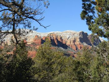 Scenic view of rocky mountains against clear sky