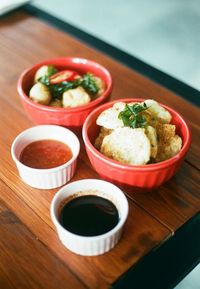 High angle view of food in bowls on tray